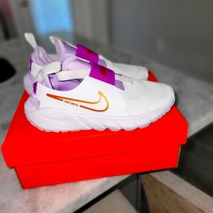 Little girls Nike slip ons